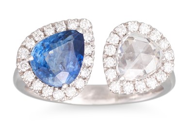 Lot 201 - A TOI ET MOI DIAMOND AND SAPPHIRE CROSS-OVER...