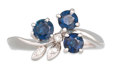 Lot 202 - A SAPPHIRE AND DIAMOND RING, mounted in 18ct...