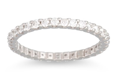 Lot 233 - A DIAMOND FULL BAND ETERNITY RING, mounted in...