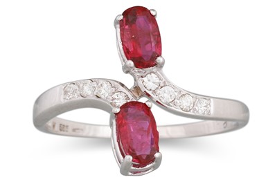 Lot 264 - A RUBY AND DIAMOND RING, of cross-over design,...