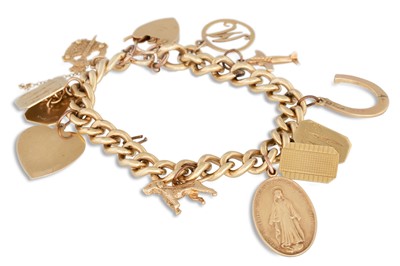 Lot 44 - A 9CT GOLD CURB LINK BRACELET, with 9 charms,...