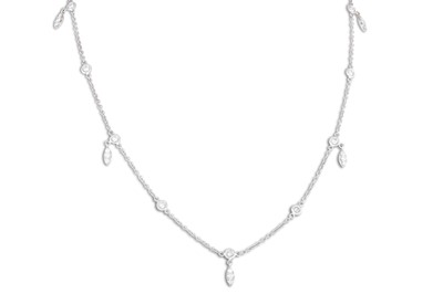 Lot 161 - A DIAMOND SET CHAIN, the collet set diamond...