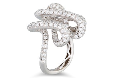 Lot 163 - AN UNUSUAL PAVE SET DIAMOND RING, twisted...