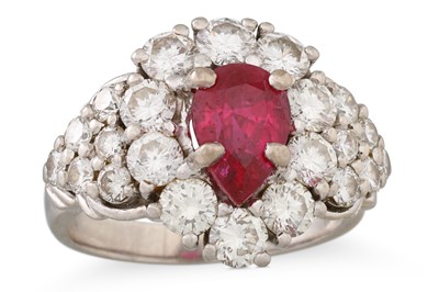 Lot 163 - A RUBY AND DIAMOND CLUSTER RING, mounted in...