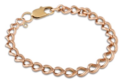 Lot 244 - A 9CT GOLD CURB LINK BRACELET, 12.8 g.