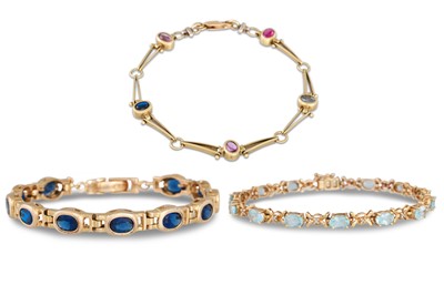 Lot 260 - THREE GOLD STONE SET BRACELETS, 28.7 g. gross...