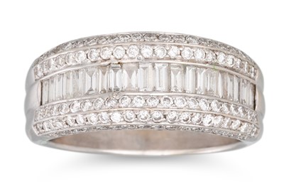 Lot 275 - A THREE ROWED DIAMOND RING, mounted in 18ct...