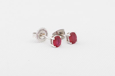 Lot 197 - A PAIR OF RUBY STUD EARRINGS, mounted in 18ct...