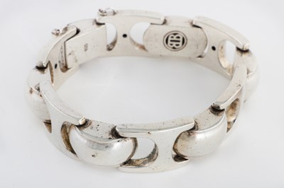 Lot 292 - A STERLING SILVER BRACELET, by Buddha to Buddha