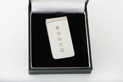 Lot 313 - A MODERN IRISH SILVER MONEY CLIP, by M D...