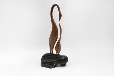 Lot 203 - A CONTEMPORARY IRISH CARVED BOG OAK FIGURE OF...