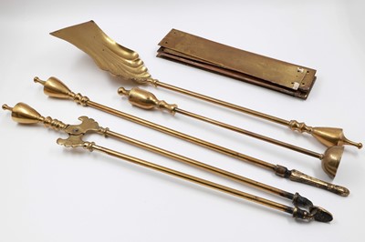 Lot 205 - A THREE PIECE BRASS FIRE IRON SET, together...