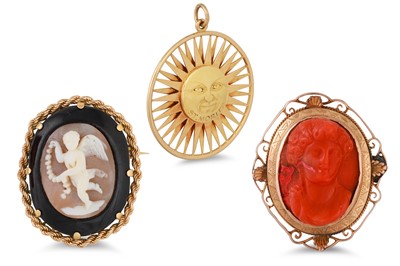 Lot 217 - A CARVED CORAL AND 9CT GOLD BROOCH, a gold...