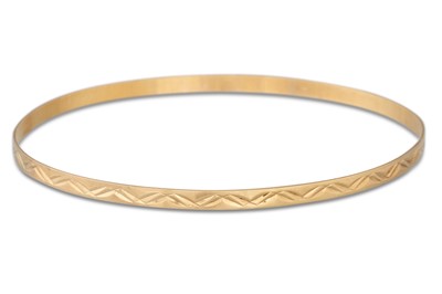 Lot 297 - A 9CT GOLD BANGLE, together with a modern...