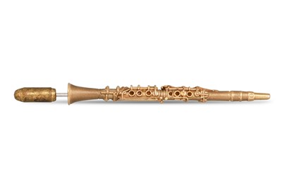 Lot 341 - A CLARINET TIE PIN, with metal stick in 9ct gold