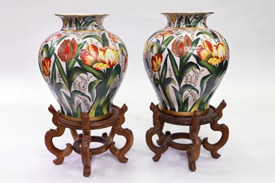 Lot 219 - A PAIR OF MATCHING VASES OF FLORAL DESIGN, on...