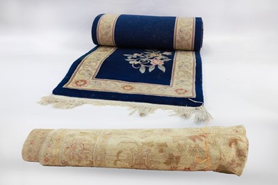 Lot 248 - A WOOL RUNNER, floral pattern of royal blue...