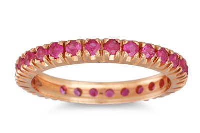 Lot 281 - A RUBY ETERNITY RING, the circular stones...