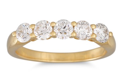 Lot 283 - A DIAMOND FIVE STONE RING, the brilliant cut...