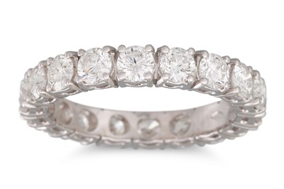 Lot 159 - A DIAMOND ETERNITY RING, the brilliant cut...