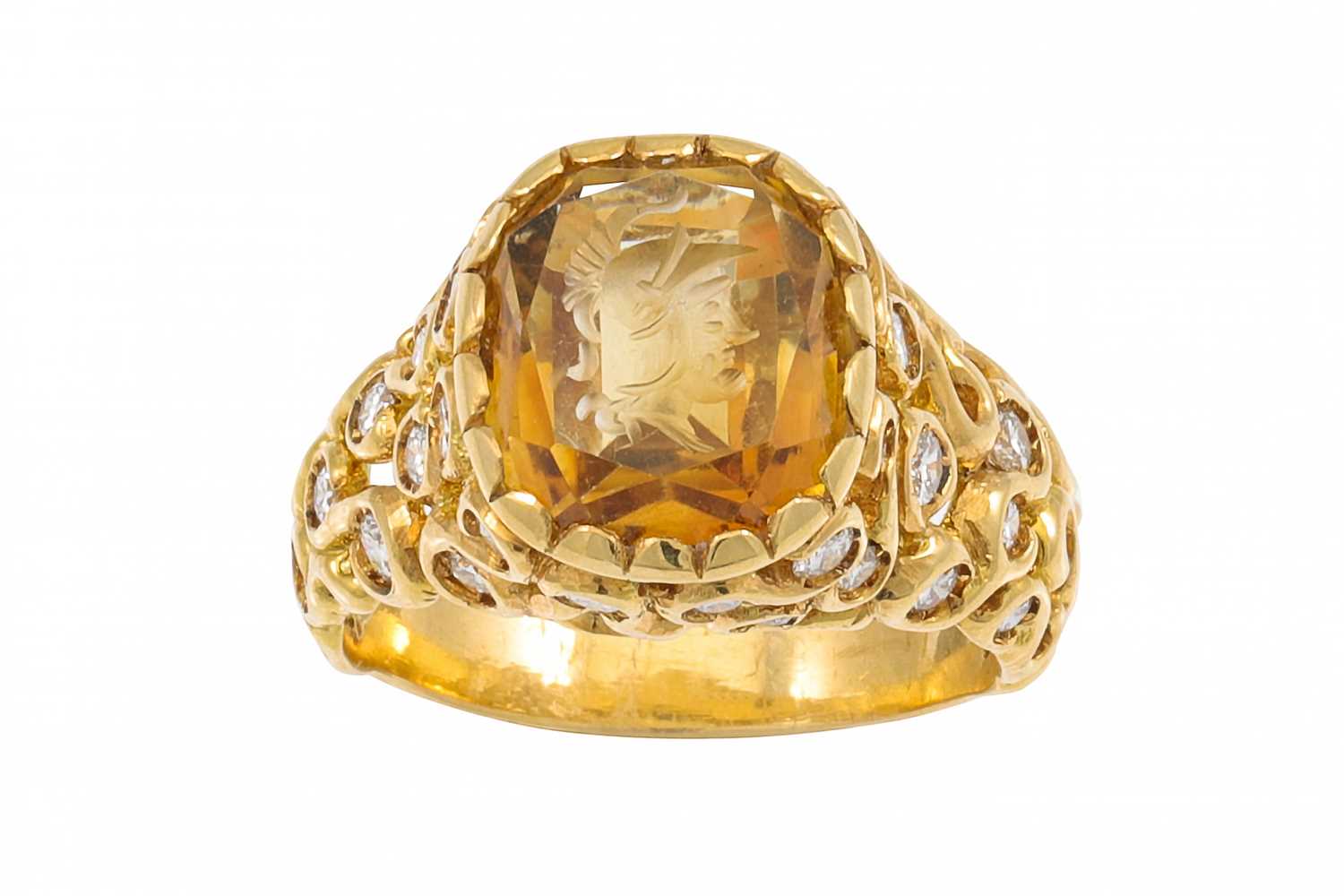 Lot 319 - A CITRINE AND DIAMOND RING, the oval citrine...
