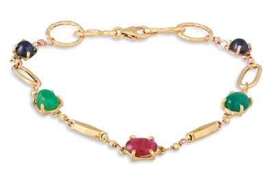 Lot 111 - AN EMERALD, RUBY AND SAPPHIRE BRACELET,...