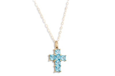 Lot 72 - A TOPAZ AND 9CT GOLD CROSS, on a 9ct gold chain