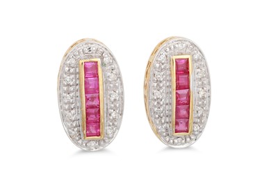 Lot 83 - A PAIR OF DIAMOND AND RUBY EARRINGS, mounted...