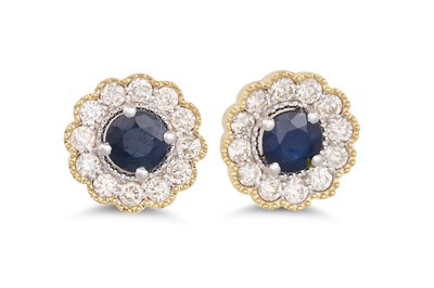 Lot 89 - A PAIR OF DIAMOND AND SAPPHIRE CLUSTER...