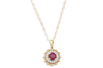 Lot 90 - A DIAMOND AND RUBY PENDANT, on a chain