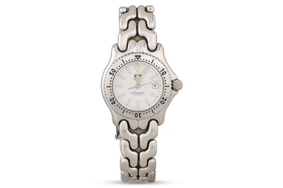 Lot 371 - A LADY'S TAG HEUER WRISTWATCH, white face,...