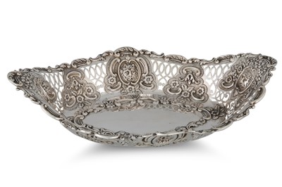 Lot 437 - AN EDWARDIAN SILVER OVAL EMBOSSED BREAD BASKET,...