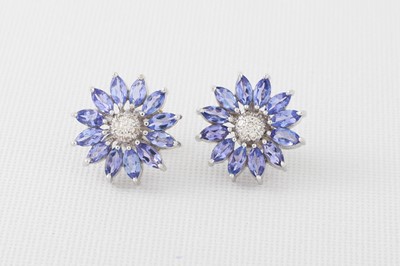Lot 13 - A PAIR OF TANZANITE AND DIAMOND EARRINGS, in...