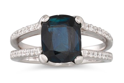 Lot 236 - A DEEP BLUE SAPPHIRE AND DIAMOND RING, the...