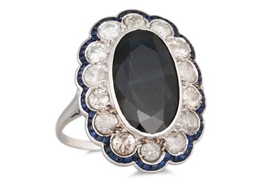 Lot 335 - A VINTAGE OVAL SAPPHIRE AND DIAMOND RING, the...