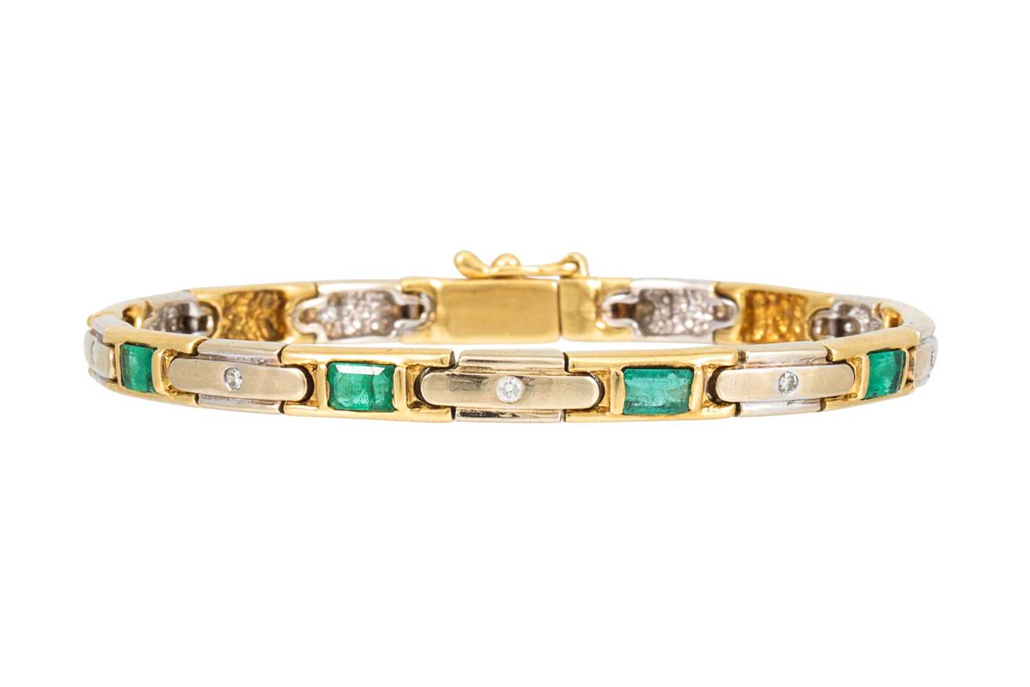 Lot 83 - AN EMERALD AND DIAMOND BRACELET, mounted in...