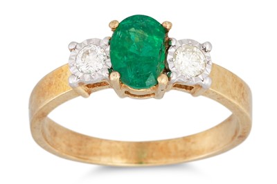 Lot 24 - AN EMERALD AND DIAMOND RING, the oval emerald...