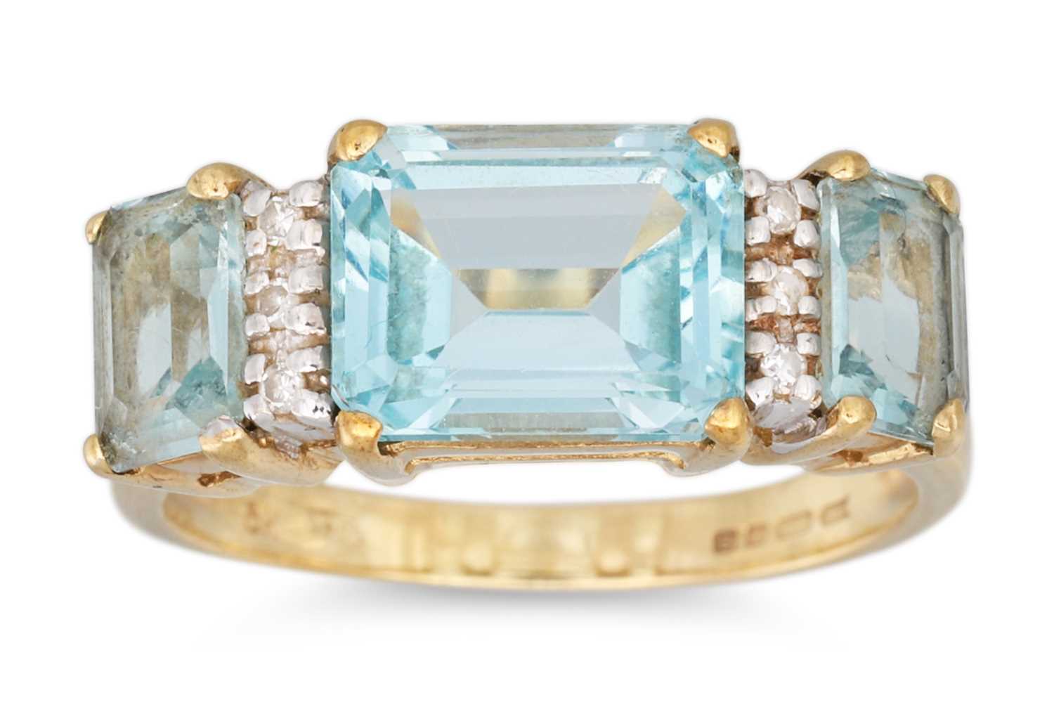Lot 35 - A DIAMOND AND TOPAZ RING, the emerald cut...