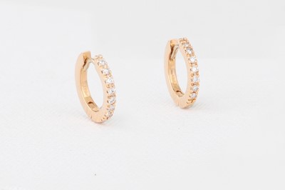 Lot 163 - A PAIR OF DIAMOND HOOP EARRINGS, mounted in...