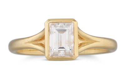 Lot 191 - AN EMERALD CUT DIAMOND SOLITAIRE RING, mounted...