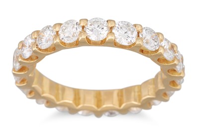 Lot 194 - A DIAMOND FULL BANDED ETERNITY RING, mounted...