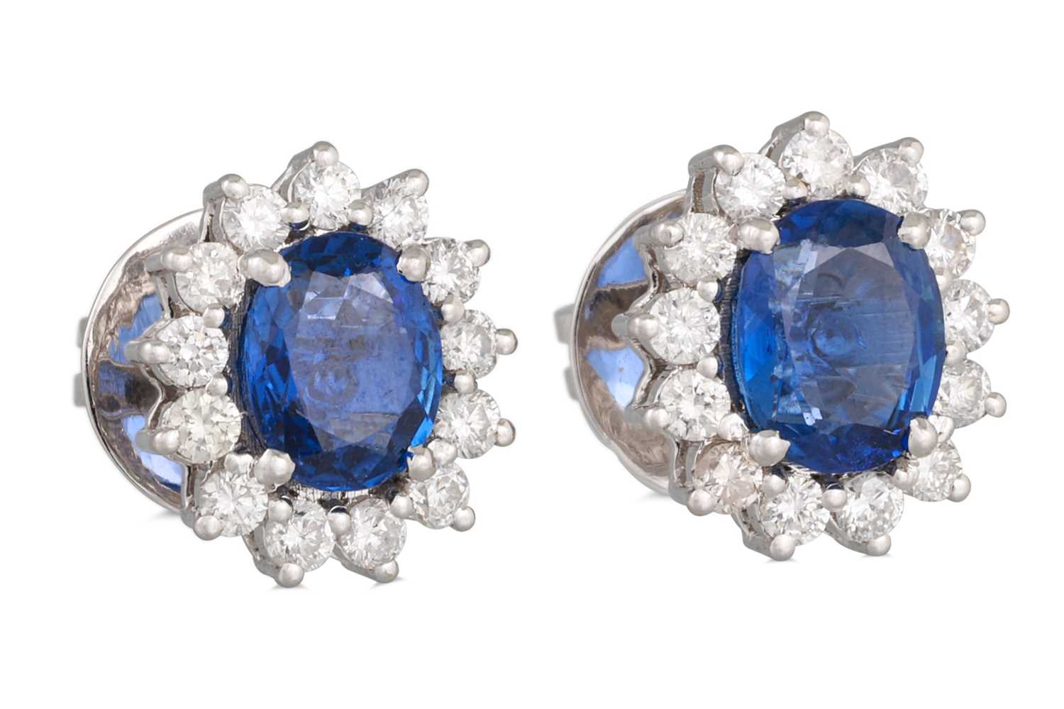 Lot 290 - A PAIR OF DIAMOND AND SAPPHIRE CLUSTER...