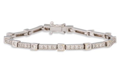 Lot 288 - A DIAMOND BRACELET, mounted in 18ct white gold....