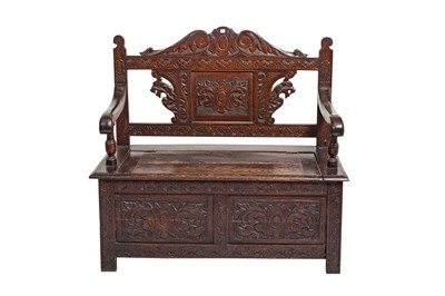 Lot 147 - A LATE VICTORIAN RECTANGULAR CARVED STAINED...