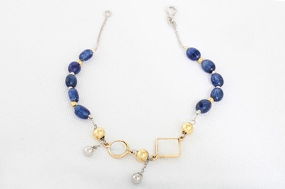 Lot 107 - A BEADED SAPPHIRE AND PEARL BRACELET, gold mounts