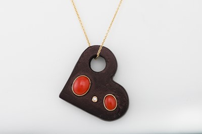 Lot 108 - A WOOD, CORAL AND DIAMOND PENDANT, heart...