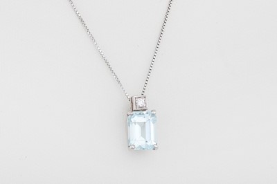 Lot 140 - AN AQUAMARINE AND DIAMOND PENDANT, mounted in...