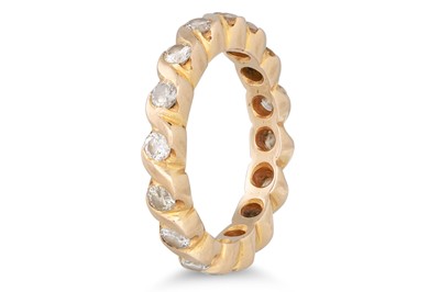 Lot 324 - A FULL DIAMOND ETERNITY RING, mounted in...