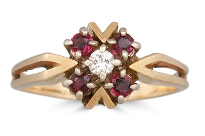 Lot 80 - A DIAMOND AND GEMSTONE CLUSTER RING, mounted...