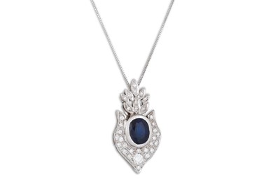 Lot 207 - A DIAMOND AND SAPPHIRE PENDANT, of shaped form,...